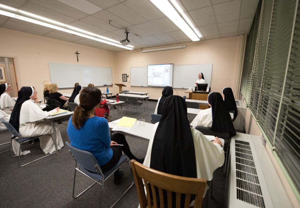 Sister teaching class