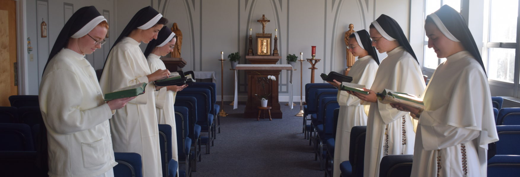 sisters praying in chapel