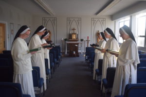 sisters praying in chapel