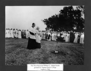 vintage photo of fr. Adrian breaking ground in 1960