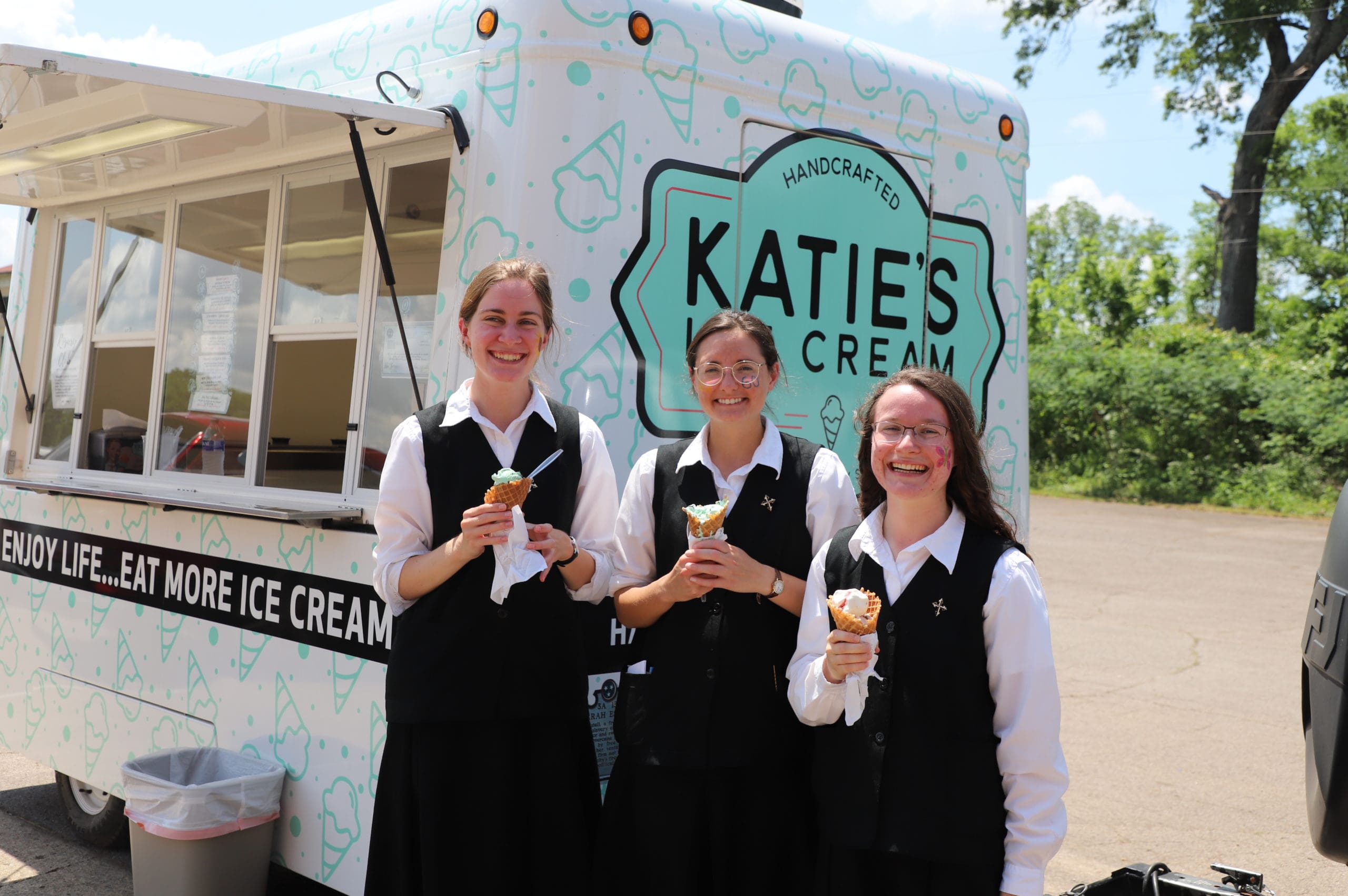 Aquinas 60th Anniversary Picnic - postulants with icecream