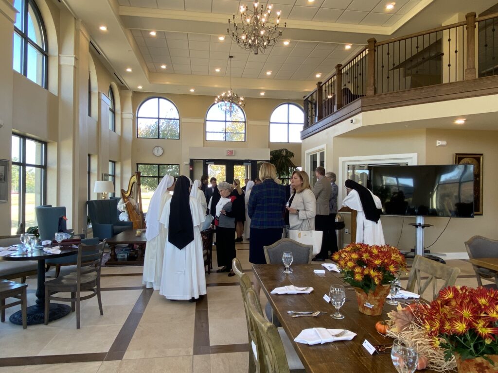 The dining space in the Main Floor Lobby has many windows for natural light and beautiful setting for gatherings, meals, and fellowship.