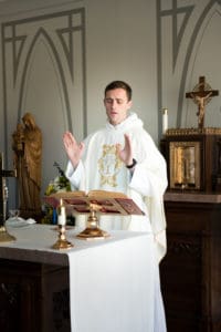Rev. Gregory Pine, O.P. celebrates Mass at St. Jude Chapel for the Aquinas College community January 25.