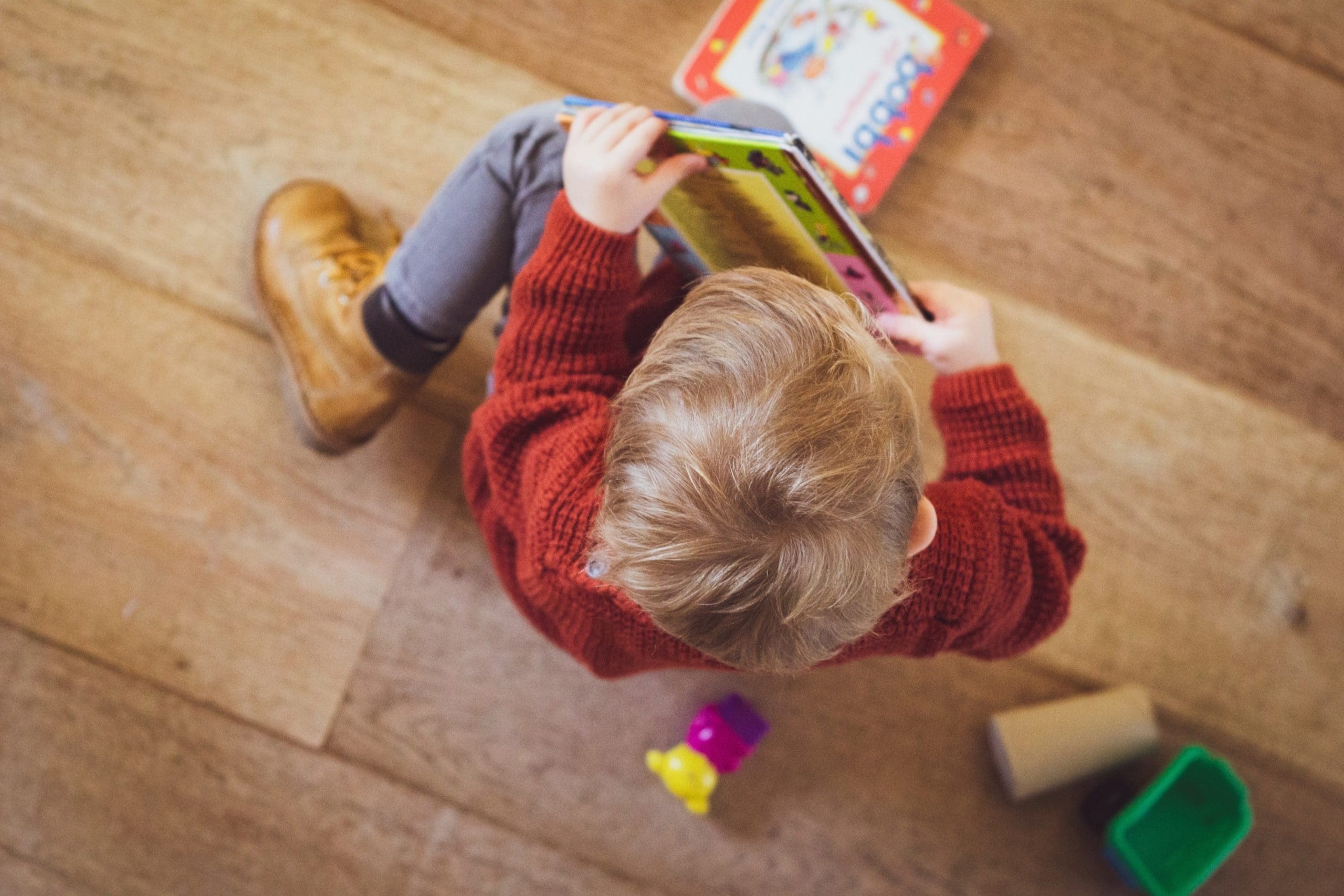 child reading book