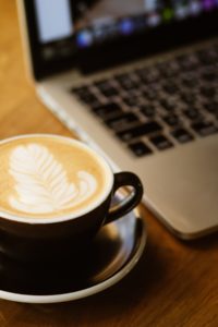 computer and a coffee