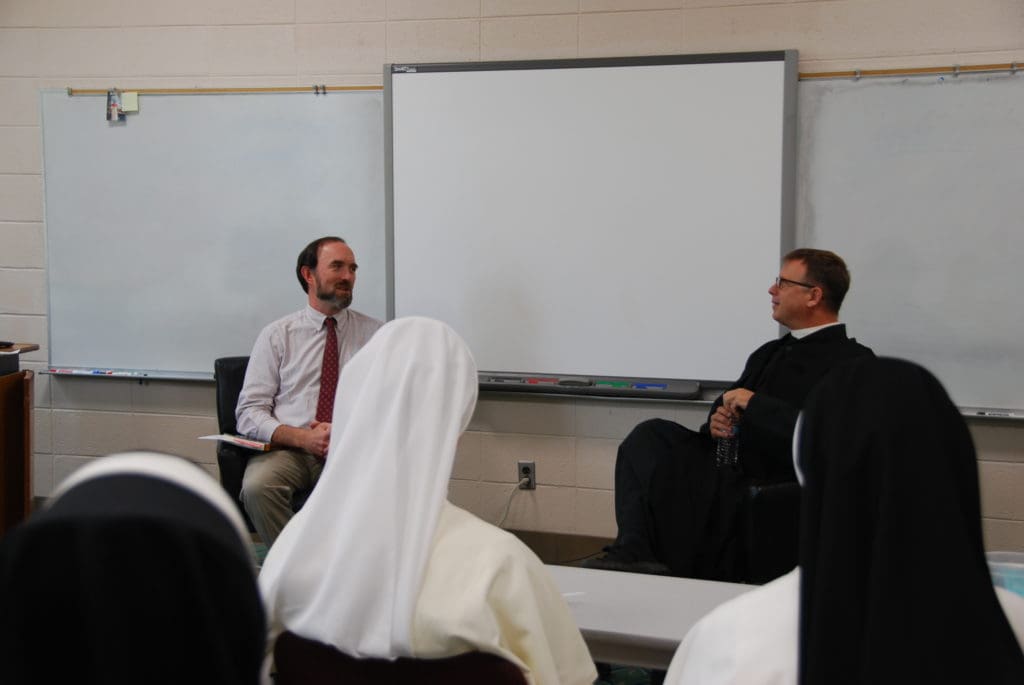 Father Wetta lectures at Aquinas College